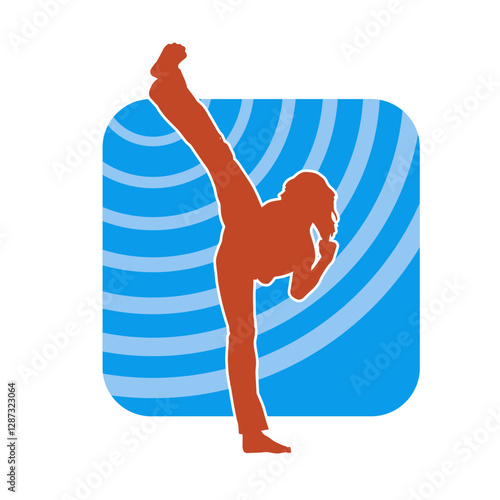 Silhouette of a slim female doing martial art pose. Silhouette of a martial art woman in action pose.