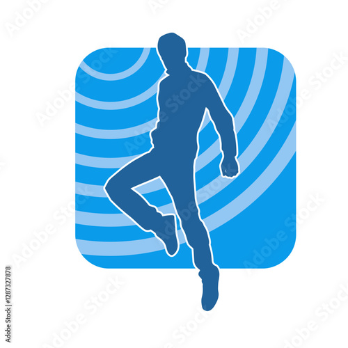 Silhouette of a male dancer in performing pose. Silhouette of a dancing man.