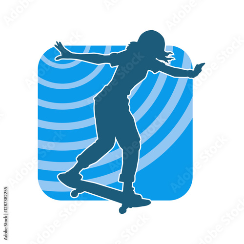Silhouette of a female in action pose on skateboard. Silhouette of an urban girl on skateboard.