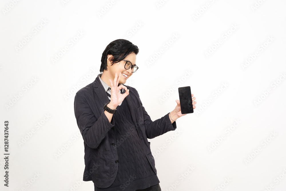 Smiling face showing okay sign Holding Smartphone and Presenting blank screen for copy space Of Handsome Asian Man Isolated On White Background Smiling face showing okay sign Holding Smartphone and Presenting blank screen for copy space Of Handsome Asian Man Isolated On White Background