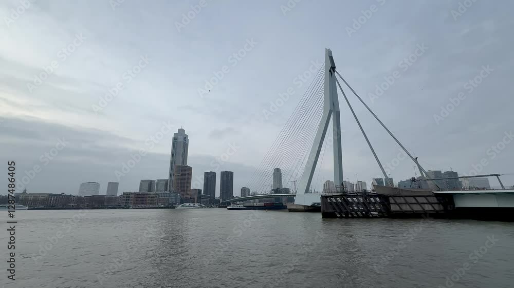 Stunning View of the Erasmus Bridge and Rotterdam Skyline – Iconic Dutch Architecture at Day Stunning View of the Erasmus Bridge and Rotterdam Skyline – Iconic Dutch Architecture at Day