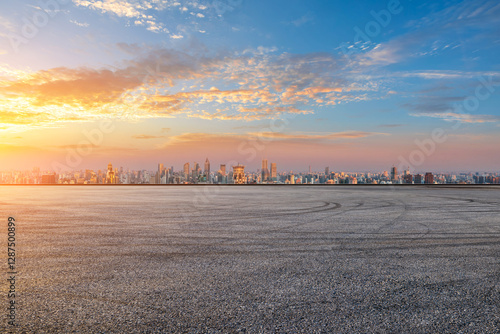 Obraz na płótnie Asphalt road square and city skyline at sunrise in Shanghai w salonie