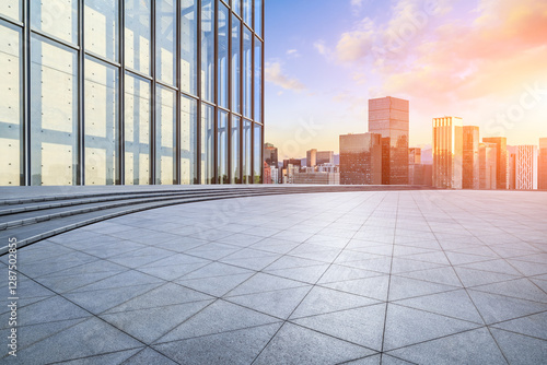 Wallpaper Mural Empty square floor and modern city buildings scenery at sunset Torontodigital.ca