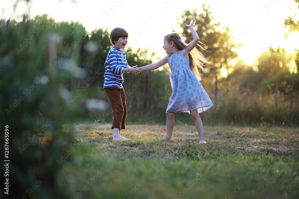 Fototapeta premium Children walk in the summer in nature. Child on a sunny spring morning in the park. Traveling with children.