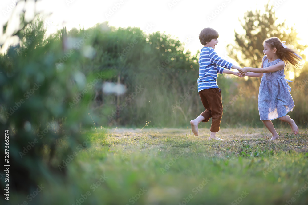 Children walk in the summer in nature. Child on a sunny spring morning in the park. Traveling with children. Children walk in the summer in nature. Child on a sunny spring morning in the park. Traveling with children.