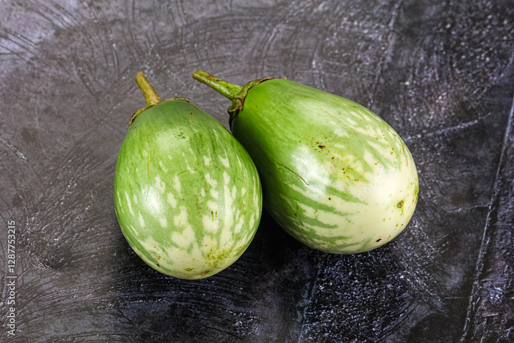 Ripe green mini eggplants heap Ripe green mini eggplants heap
