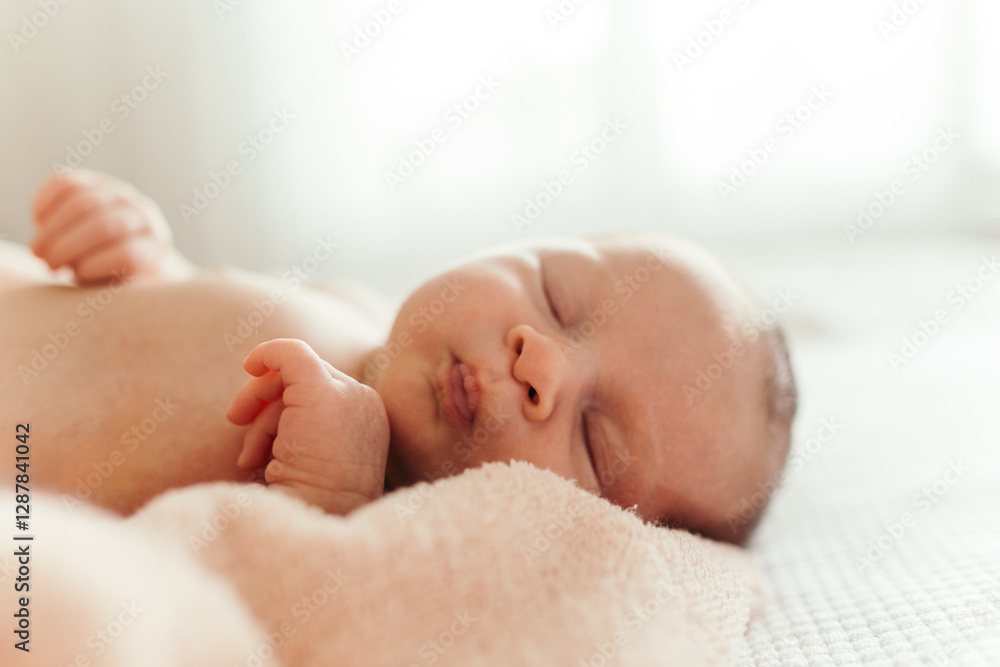 baby girl wrapped in a blanket sleeping. baby girl wrapped in a blanket sleeping.