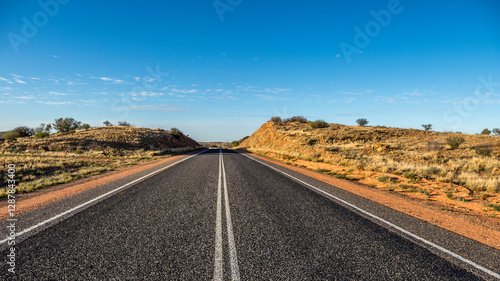 wide-angle view of the carriageway of a freeway crossing Australia