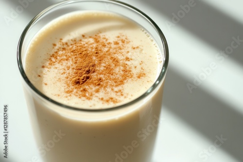 Close Up Cinnamon Smoothie In Glass (Beverage) (Healthy Drink) (Dairy) (Vegan Friendly) (Smooth)