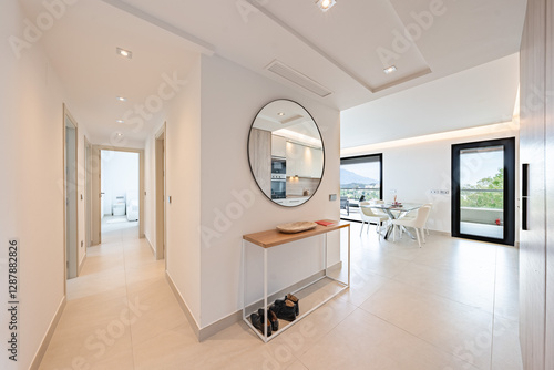 an image of the illuminated entrance to a luxury mediterranean apartment 