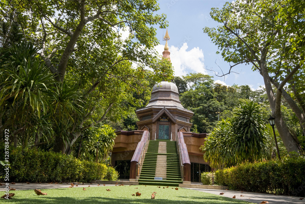 Serenity Thai Pavilion in Lush Garden or Tranquil Buddhist Shrine Amidst Tropical Greenery Serenity Thai Pavilion in Lush Garden or Tranquil Buddhist Shrine Amidst Tropical Greenery