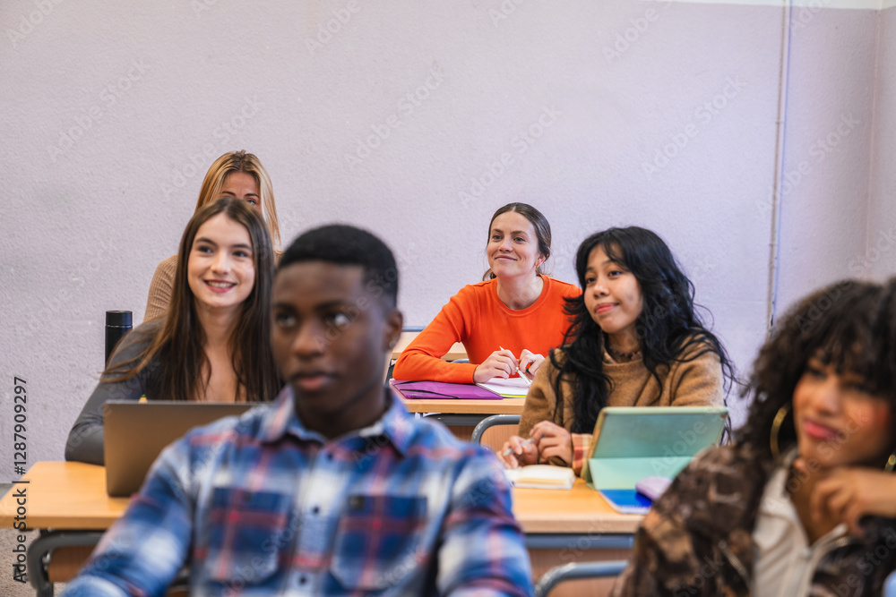 Obraz premium High school students listening to teacher in classroom