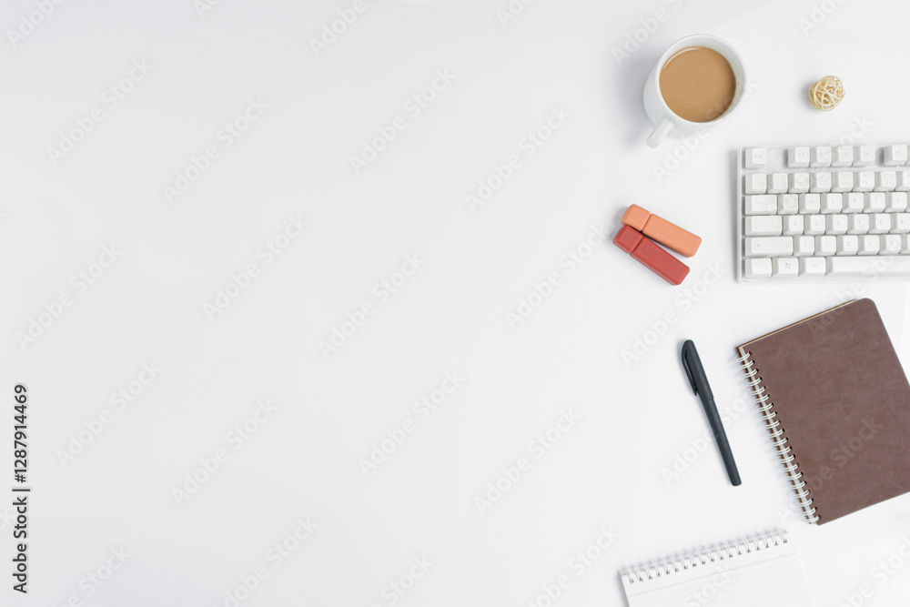 Minimalist White Desk Layout, Complete With A Cup Of Coffee, Two Red Lipsticks, And A Brown Notebook With A Black Pen. Looks Very Elegant And Professional. Minimalist White Desk Layout, Complete With A Cup Of Coffee, Two Red Lipsticks, And A Brown Notebook With A Black Pen. Looks Very Elegant And Professional.