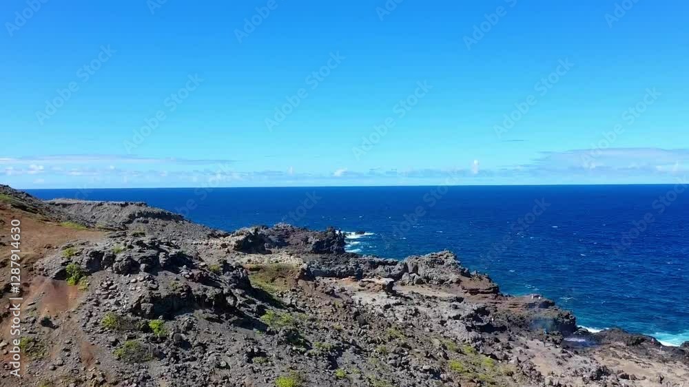 Maui, West Coast, Hawaii, USA. Beautiful scenery on the rocky coast with Blowholes and Waves Maui, West Coast, Hawaii, USA. Beautiful scenery on the rocky coast with Blowholes and Waves
