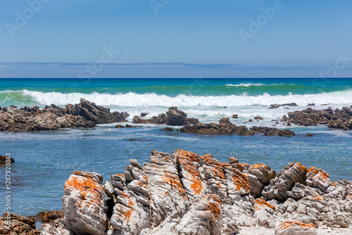 The rocky shore of Cape Agulhas, where the Indian and Atlantic Oceans meet, is a cape in South Africa, the southernmost point of Africa.