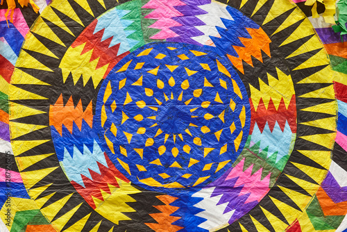 Obraz na płótnie Traditional colorful paper handmade barrilete kite. Handcrafted in Guatemala. w salonie