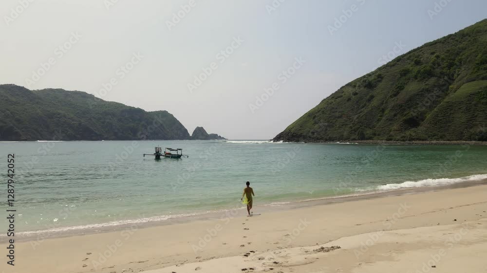 Tropical Beach Escape – Woman Running Towards the Ocean with Boat and Scenic Hills in the Background. Tropical Beach Escape – Woman Running Towards the Ocean with Boat and Scenic Hills in the Background.