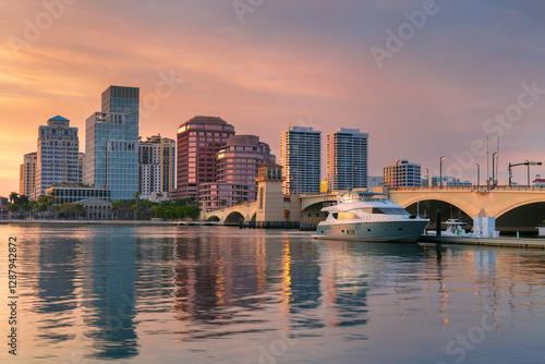 Obraz na płótnie West Palm Beach, Florida, USA. Cityscape image of West Palm Beach, Florida with reflection of the city skyline in the water at beautiful sunset. w salonie