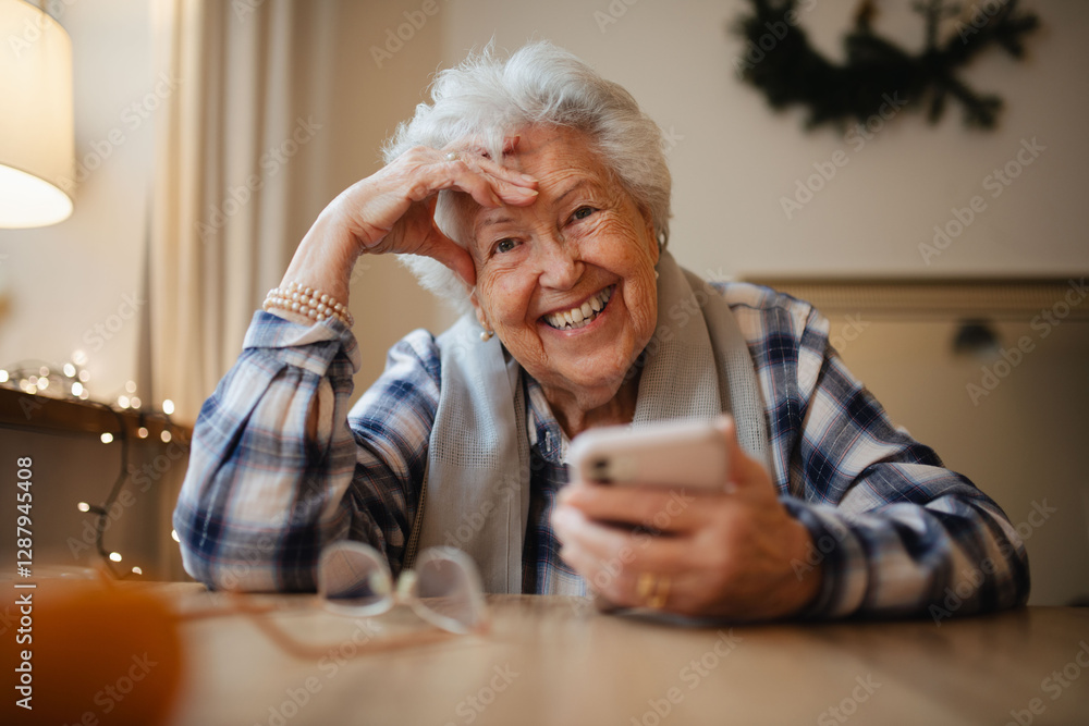Elderly woman feeling confident while using smartphone. Elderly woman feeling confident while using smartphone.