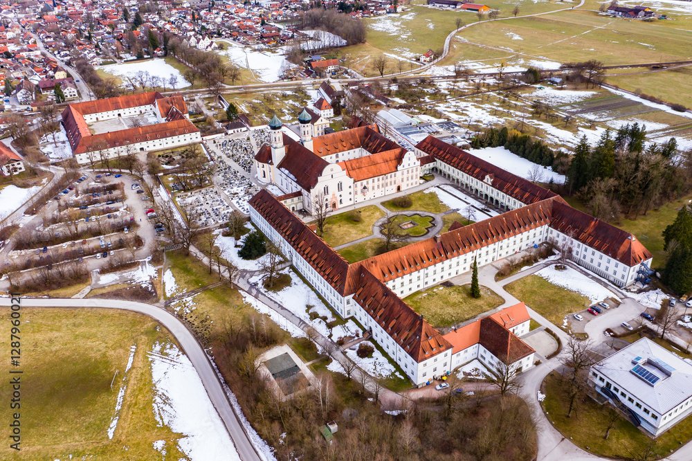 Aerial view over Benedictine monastery Benediktbeuren in winter, Bavaria, Germany Aerial view over Benedictine monastery Benediktbeuren in winter, Bavaria, Germany
