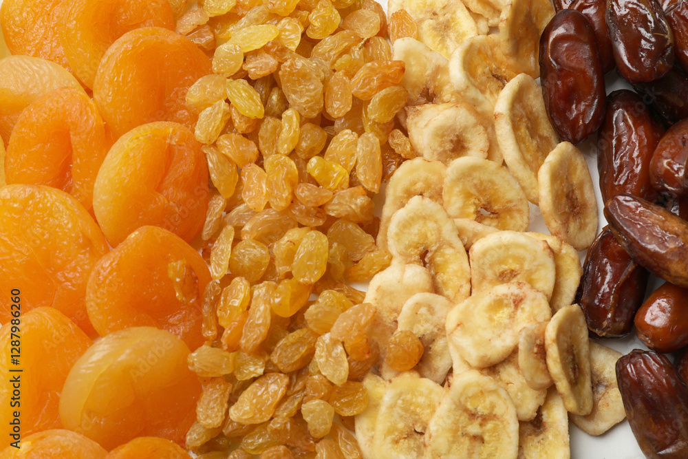 Different dried fruits as background, top view Different dried fruits as background, top view