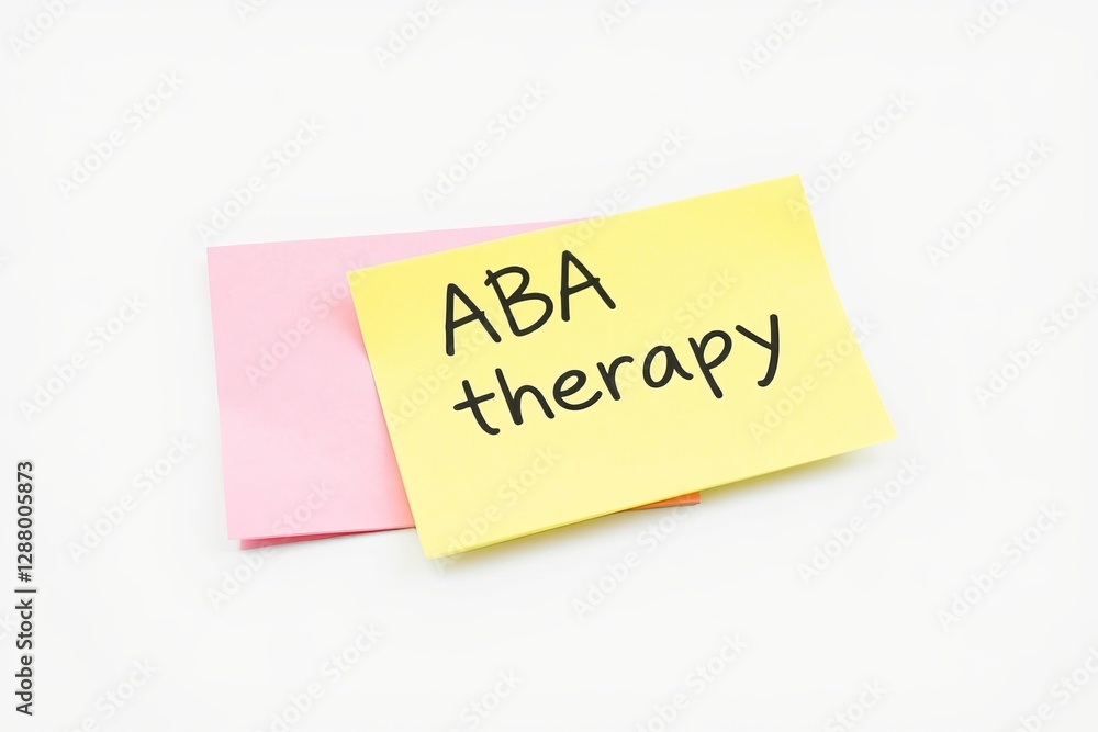 Text ABA therapy on yellow note Text ABA therapy on yellow note
