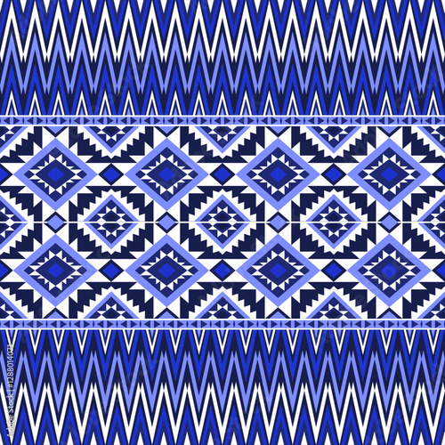 Geometric Tribal Pattern in Blue Tones  A digital geometric tribal pattern . The design includes repeating diamond and zigzag motifs, creating a bold and symmetrical look.