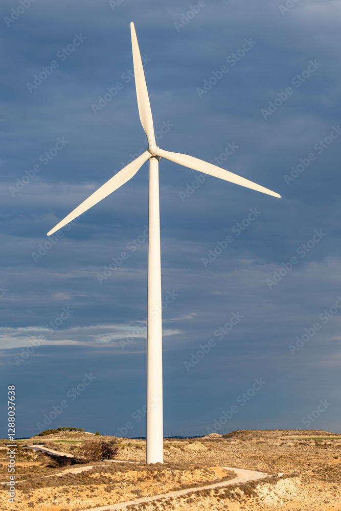 Isolated wind turbine in an open field in Zaragoza, Spain, symbolizing innovation and environmental responsibility. Isolated wind turbine in an open field in Zaragoza, Spain, symbolizing innovation and environmental responsibility.