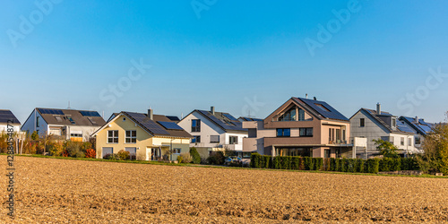 Modern residential houses with photovoltaic systems in Germany photo