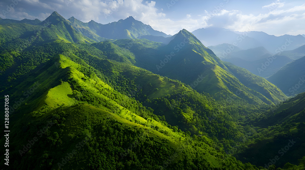 Fototapeta premium Lush Green Mountain Range Under a Bright Sunny Sky