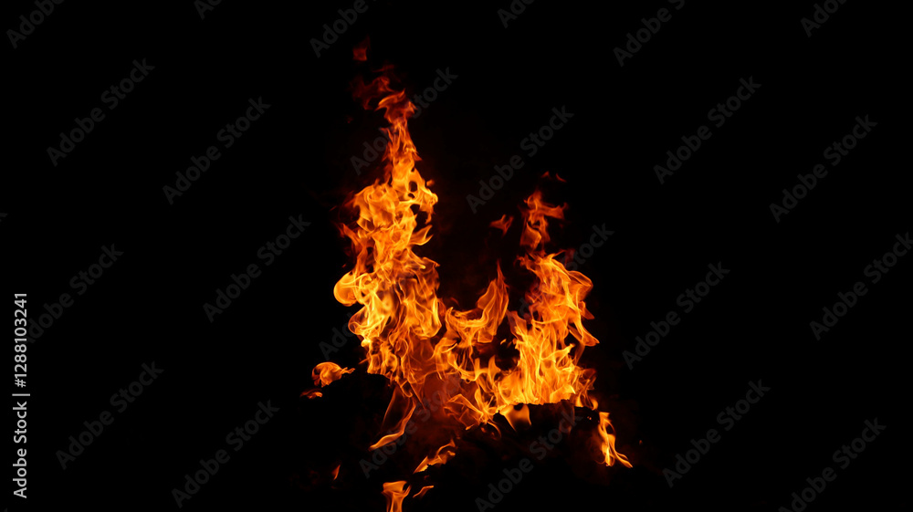 A mesmerizing close-up of a blazing fire against a dark background A mesmerizing close-up of a blazing fire against a dark background