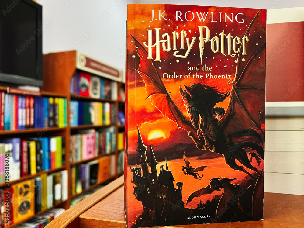 Naklejka premium Harry Potter and the Order of the Phoenix book in a bookstore setting.