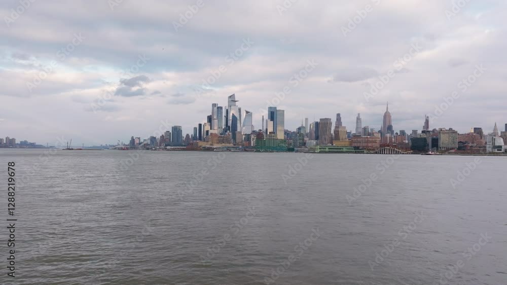 Aerial view capturing Hudson Yards and Manhattan skyline, revealing glowing skyscrapers against twilight, luminous urban landscape transforming Aerial view capturing Hudson Yards and Manhattan skyline, revealing glowing skyscrapers against twilight, luminous urban landscape transforming