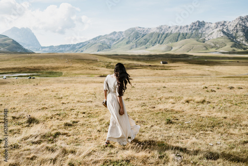 fashion woman walking in the nature 