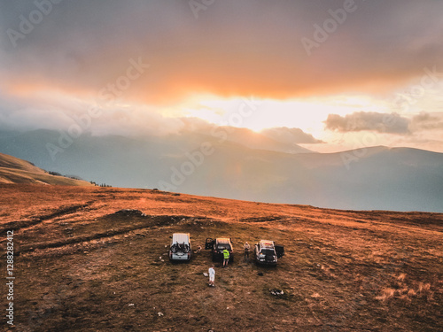 Travel with friends on Transalpina Road, Romania, Sunset in Mountains