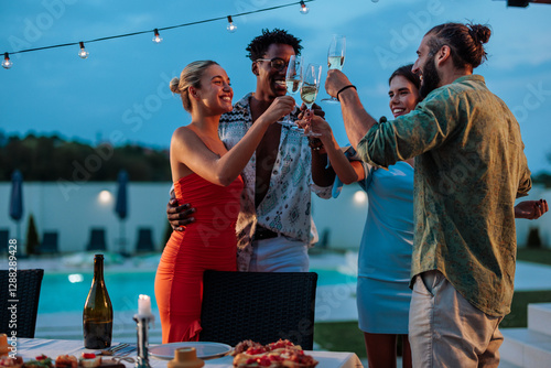 Wall Mural Friends toasting with champagne glasses at luxury pool party
