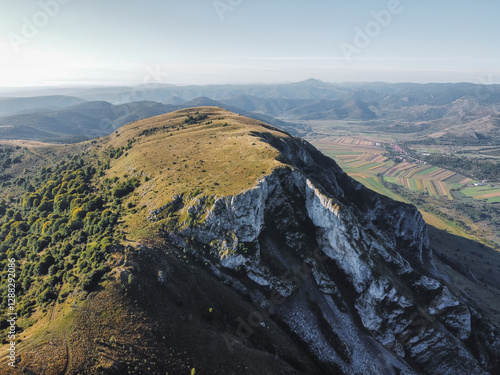 Misty Morning in the Romanian Mountains – Aerial View of Foggy Hills and Rocky Cliffs