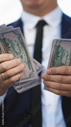 Vertical Video of World economic crisis. Businessman Counting Money Usd Bills Payday. Total unemployment in a pandemic. Bribe. Dirty money. Successful business. Symbol of success, gain, victory