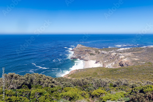 The rocky shore of Cape Agulhas, where the Indian and Atlantic Oceans meet, is a cape in South Africa, the southernmost point of Africa.