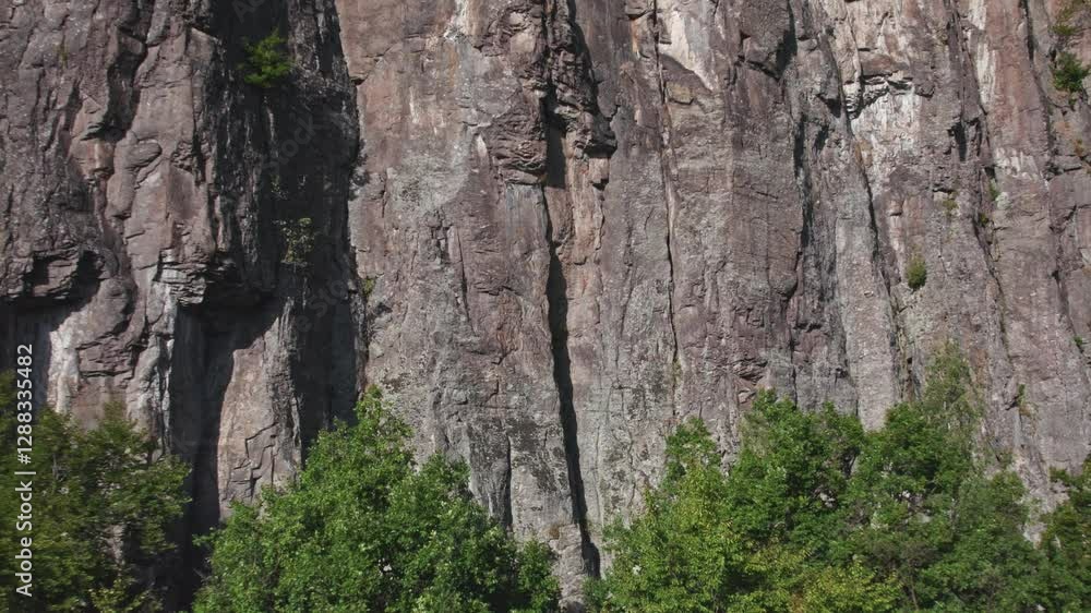 Aerial of natural mountain sport climbing andesite wall. Hradok, Vtacnik mountain range is fantastic high difficulty climbing location in Slovakia. Aerial of natural mountain sport climbing andesite wall. Hradok, Vtacnik mountain range is fantastic high difficulty climbing location in Slovakia.