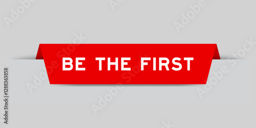 Red color inserted label with word be the first on gray background