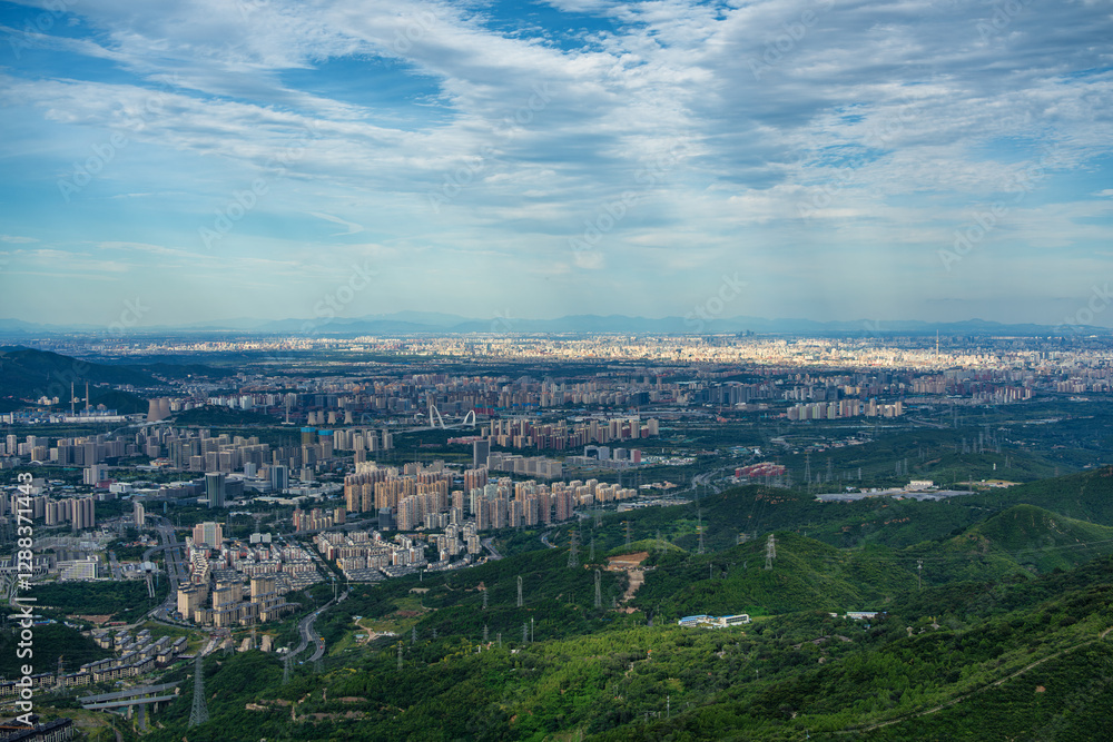 Fototapeta premium Overlooking Beijing western part from mountains