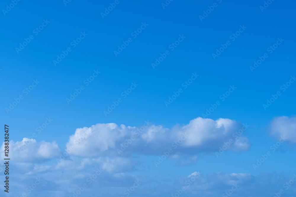 Sky Blue Background,Summer clear sky, cloud over beach, Horizon landscape beautiful spring nature with white dramatic cloudy and sunlight for environment concept Sky Blue Background,Summer clear sky, cloud over beach, Horizon landscape beautiful spring nature with white dramatic cloudy and sunlight for environment concept