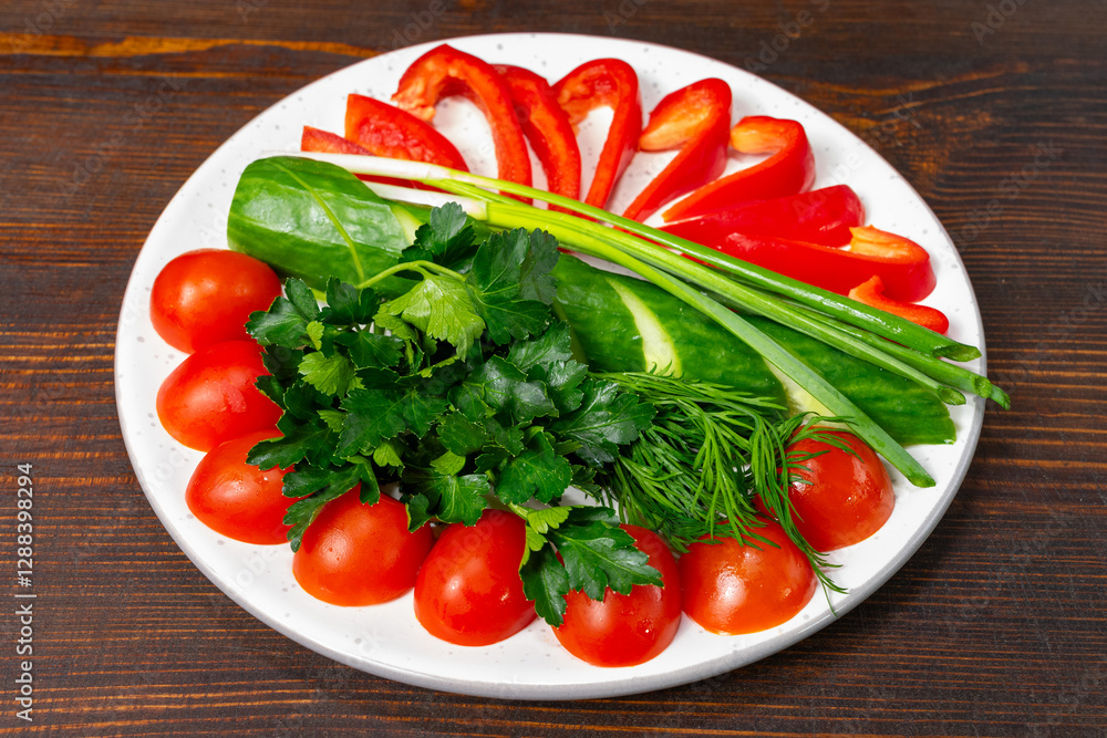 Fresh vegetables arranged on a plate for healthy eating Fresh vegetables arranged on a plate for healthy eating