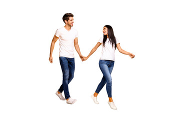 Come with me honey! Full body photo of two people walking down street for shopping wear casual clothes isolated yellow color background