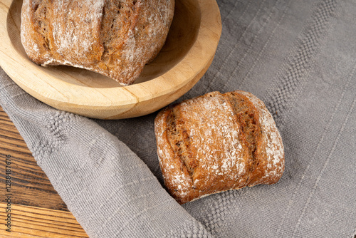 Brown rye bun, square gluten free bread, whole grain healthy breakfast bread photo