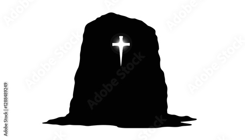 Silhouette of stone with cross illuminated