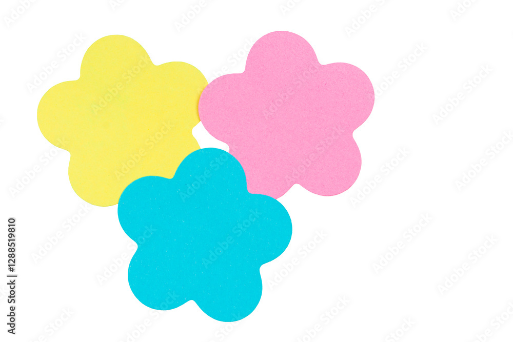 Many color paper flower figures on white background, flat lay.