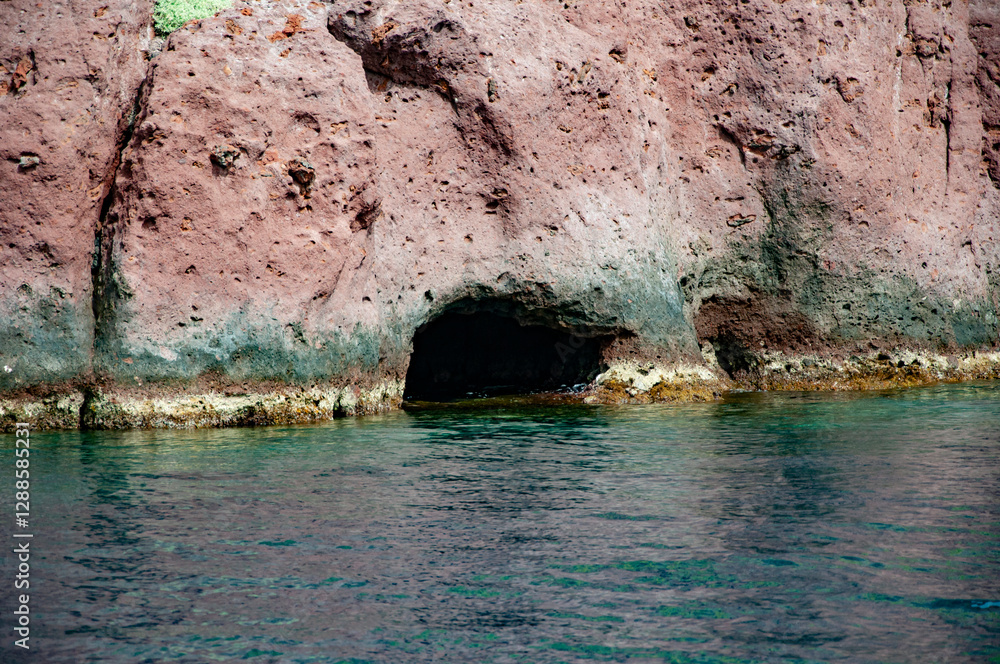 Stone cave. Nature formation. Geological rock formation. Tourism and travel destination, Greece. Geology. Volcanic rock nature. Rock formation with erosion. Landscape with rock formation Stone cave. Nature formation. Geological rock formation. Tourism and travel destination, Greece. Geology. Volcanic rock nature. Rock formation with erosion. Landscape with rock formation