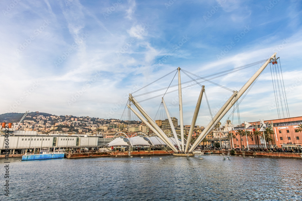 Naklejka premium Porto Antico in Genova Italy with beautiful blue clouds in the background.
